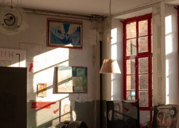 Sun shining into a small art gallery.