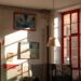 Sun shining into a small art gallery.