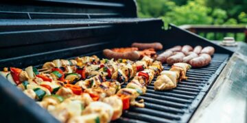 We joined a few friends for a Sunday afternoon cookout, and I found myself manning the grill. The colors caught my eye first, as I loved the contrast of the colorful kebabs with the blue of the grill and the green of the yard behind.