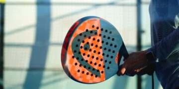 A padel racket in the game.